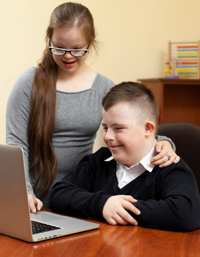 Child with developmental needs receiving support during an ADHD assessment with a caregiver