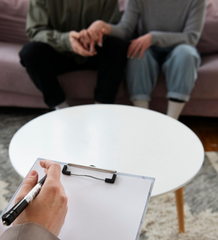 Psychological assessments for couples with a psychologist evaluating relationship concerns during a counselling session